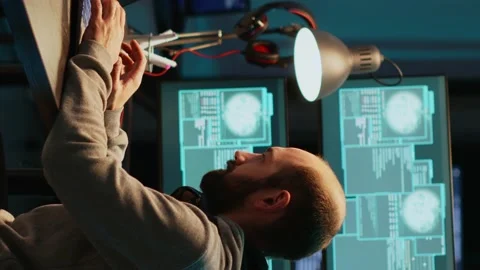 Vertical video: Young IT criminal hacking server to destroy information Stock Footage 221796785