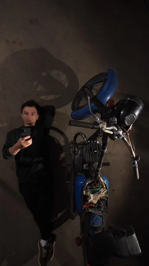 Vertical video young man capturing a high angle self portrait on his Stock Footage 342765821