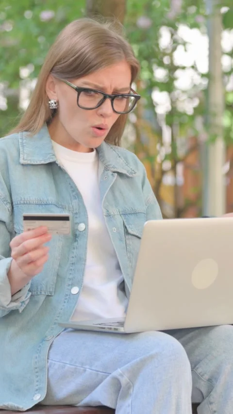 Vertical Video, Young Woman Using Smartphone and Laptop Outdoors Stock Footage 318009136