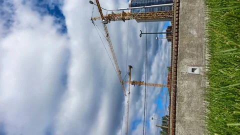 Vertical video.Time lapse of working construction cranes. Stock Footage 134060324