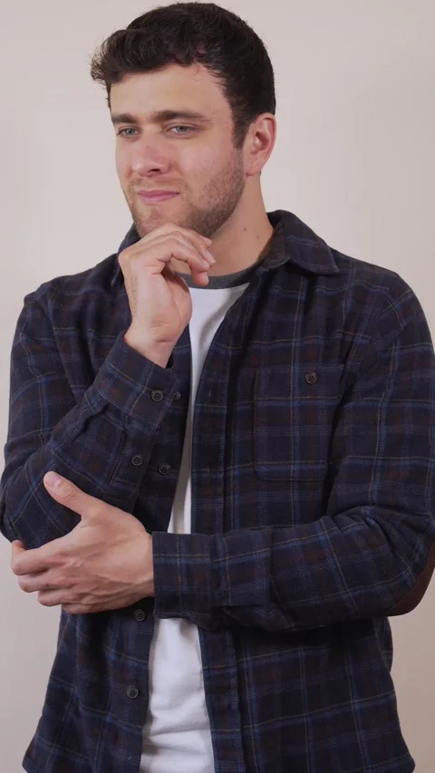 Vertical video.white man, taking an important decision which does not convi.. Stock Footage 236678293