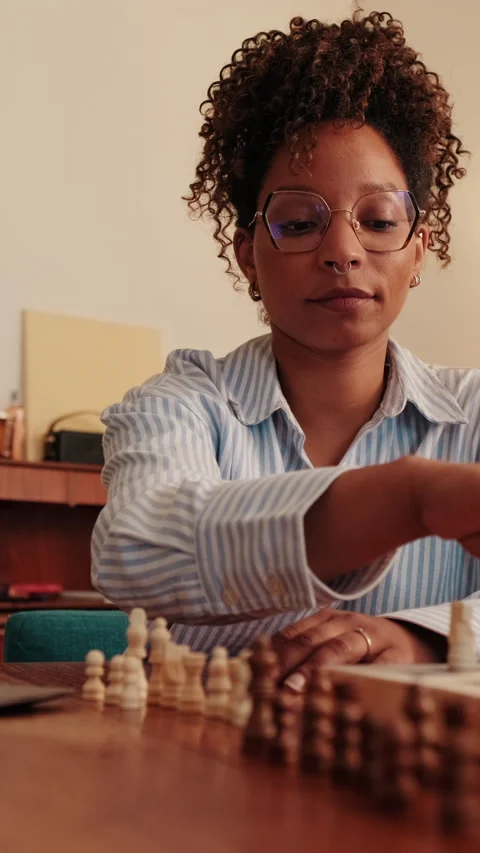 Vertical video,Woman Playing Online Chess at Home Stock Footage 314628248