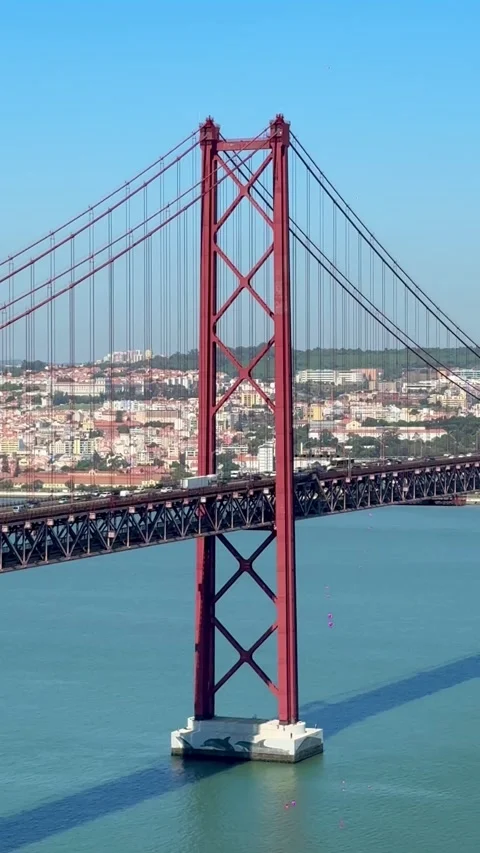Vertical View of 25 de Abril Bridge in Lisbon Portugal Видео 347024021