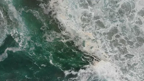 Vertical view from above of large foaming Atlantic waves near the coast. Stock Footage 135149949
