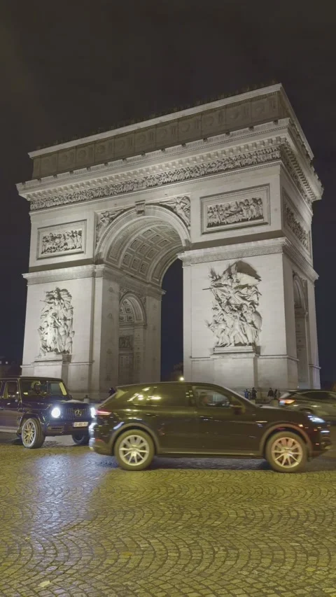Vertical view of the Arc de Triomphe and traffic at night in Paris, France Stock Footage 328962229