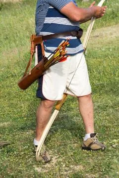 Vertical View of an Archery Teacher During a Lesson Explaining How to Use the Stock Photos