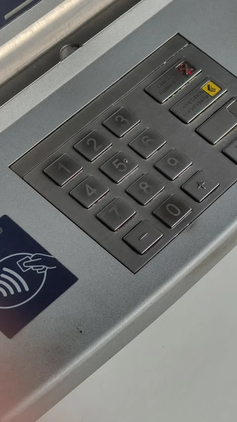 Vertical View of ATM Machine Metal Keypad for Secure PIN Code Entry Stock Footage 321372430
