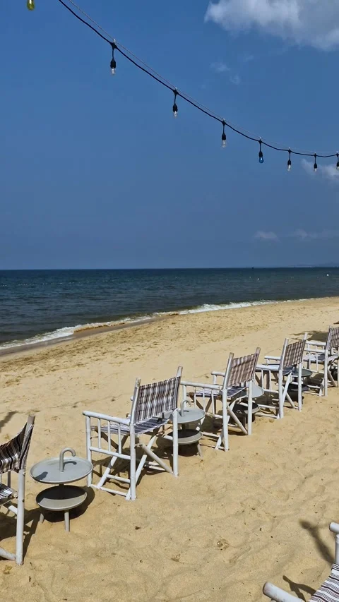 Vertical View of Beach on Phu Quoc Island, Chairs and Small Tables on Sand Stock Footage 339718664