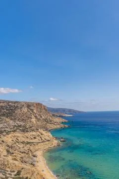 Vertical view of beautiful cliffs with blue sea. Summer background. Stock Photos