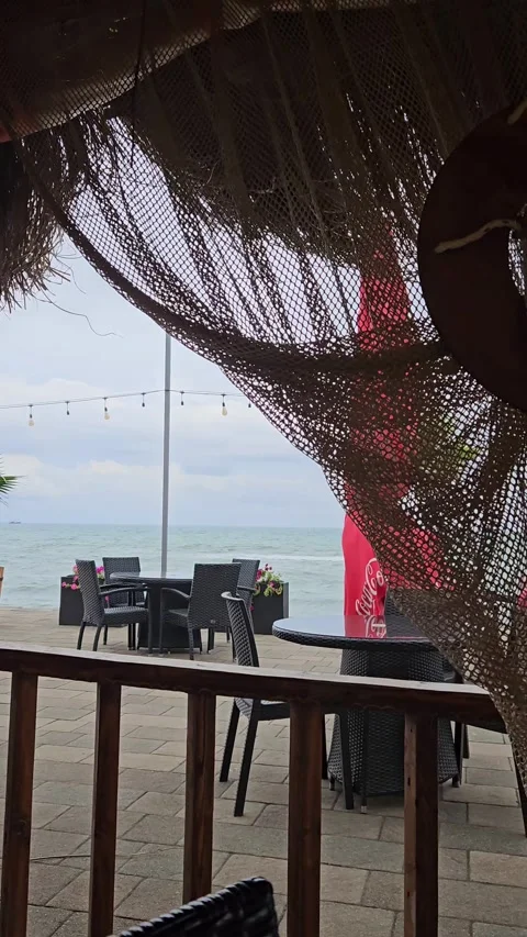 Vertical view of the Black Sea from a beach bungalow restaurant Stock-Footage 338005688