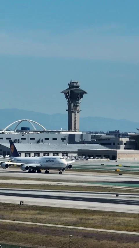 Vertical View of Boeing 747 Taking off From LAX Airport Stock Footage 344335851