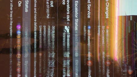 Vertical view of the broken screen with timetable in the NYC underground. Video stock 250354974