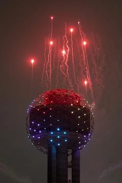 Vertical view of colorful fireworks exploding above the Reunion Tower in Dallas, 写真素材