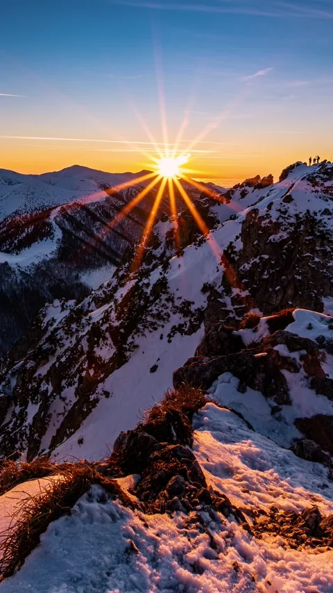 Vertical view of colorful sunset in winter Alpine mountains, Time lapse Stock Footage 307708896
