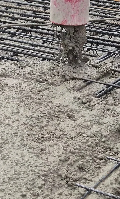 Vertical View of Concrete Pump Hose Pouring Concrete Stock Footage 335709458