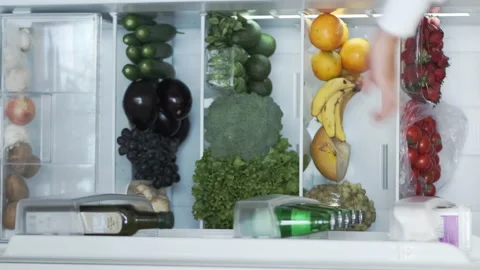Vertical View of Cooler or Refrigerator Full of Fresh Organic Vegetables and Stock Footage 168170322