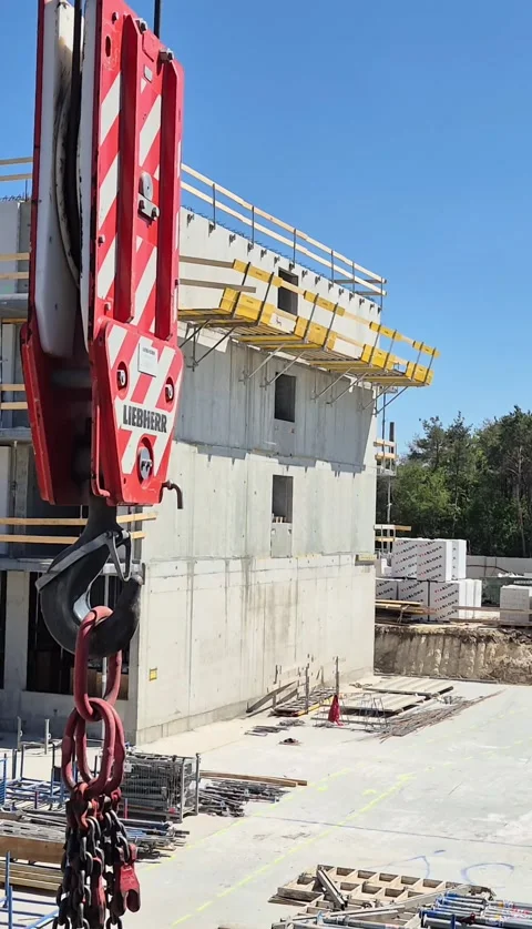 Vertical View of Crane Hook Lifting Equipment at Construction Site Stock Footage 341104465