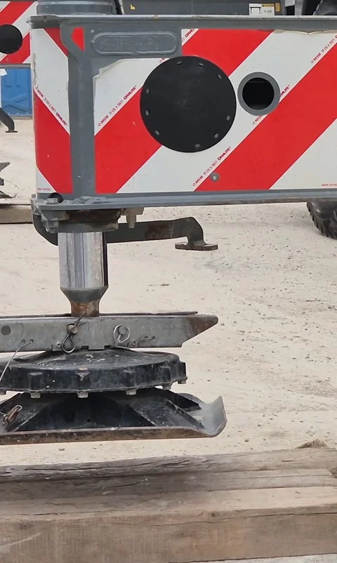 Vertical View of Crane Hydraulic Outrigger Cylinder Retracting Stock Footage 341104486