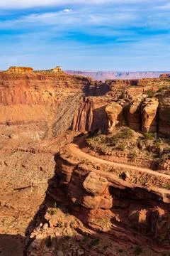 Vertical view of dirt road on cliffs in Canyonlands National Park Stock-Fotos