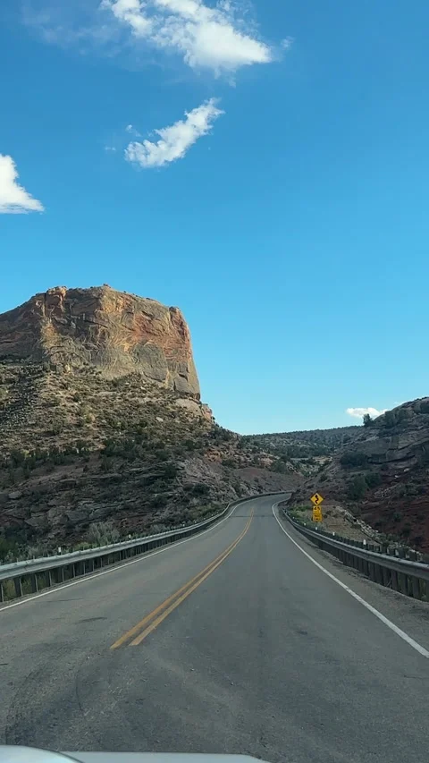 Vertical View, Driving on Empty Road in Desert Landscape of Utah USA, Driver Stock Footage 337653622