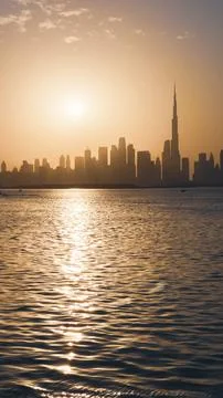 Vertical view of Dubai Skyline reflection in water, creek harbor view Stock Photos