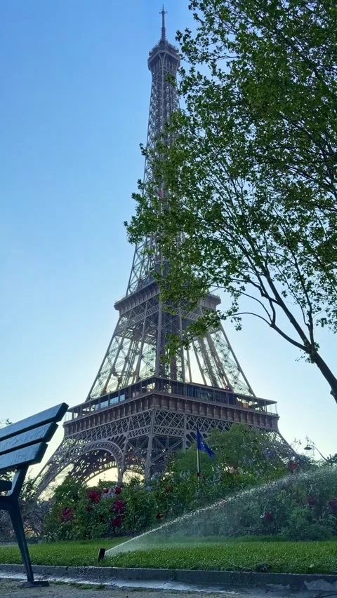 Vertical View of Eiffel Tower with Park Sprinklers in Paris France Stock Footage 340602479