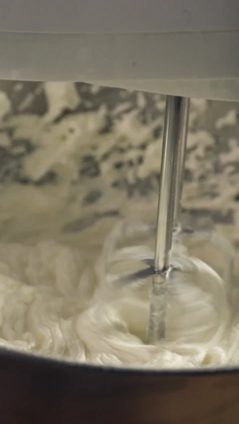 Vertical View Of An Electric Hand Mixer For Baking. Close-up Shot Stock Footage 329004385