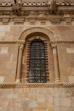 Vertical view of exquisite romanesque window in san isidoro church Stock Photos