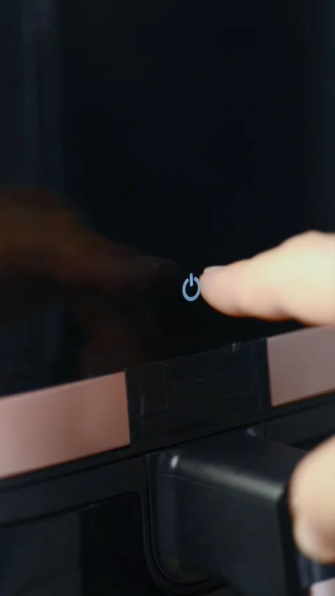Vertical view of a finger pressing button to turn off an air fryer screen Stock Footage 343963630
