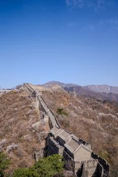 Vertical view of Great Wall winding along mountain ridge Stock Photos