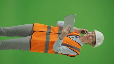 Vertical View Green Screen Female Hat Cheerfully Talking with Client on Phone Stock Footage 239291697