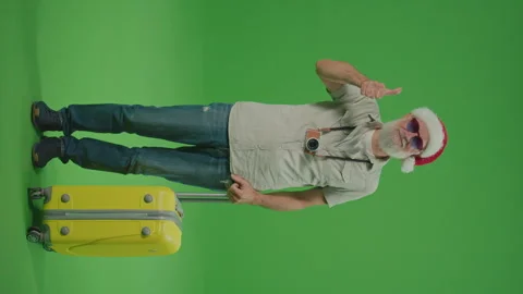 Vertical View. Green Screen. An Old Man in a Santa Hat Shows Thumb Up. Stock Footage 243468275