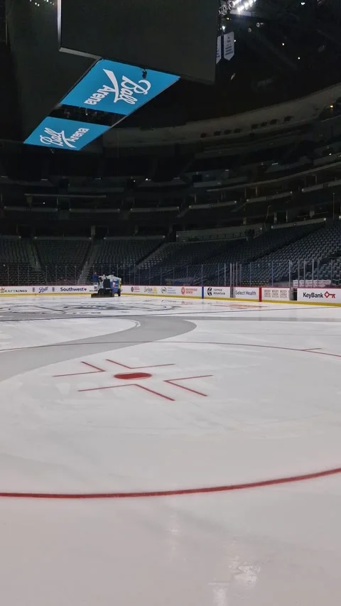 Vertical View of Ice Resurfacer Preparing Surface For Avalanche Game in Ball Stock Footage 345386556