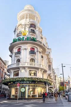 Vertical view of the iconic Edificio Grassy on Gran Via street in Madrid Stock Photos