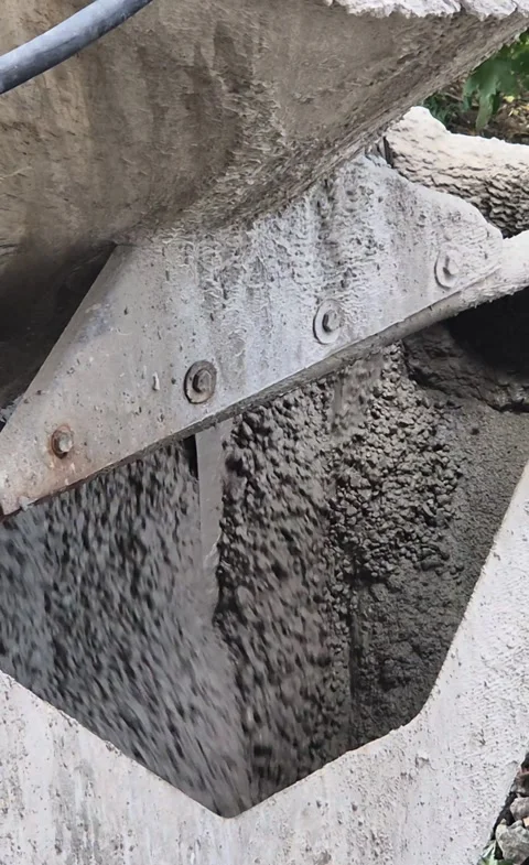 Vertical - View inside concrete mixer truck showing spiral blade Stock Footage 343412837