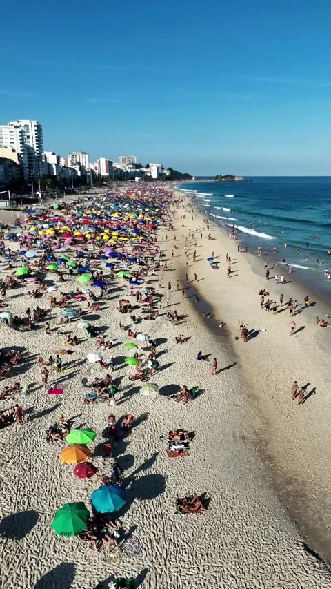 Vertical View of Ipanema Beach Crowds and Umbrellas Stock Footage 312766449