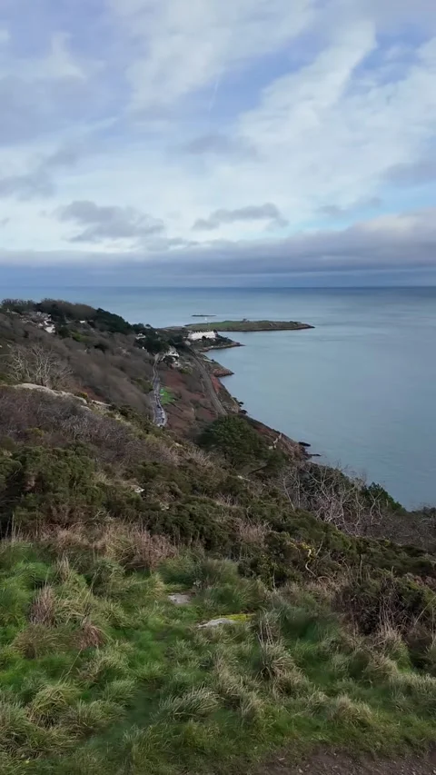 Vertical View of Irish Coastal Cliffs and Atlantic Ocean Stock Footage 327624900