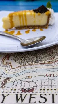 Vertical View of Key Lime Pie Served on a Key West Map Placemat in Florida Fotos de archivo