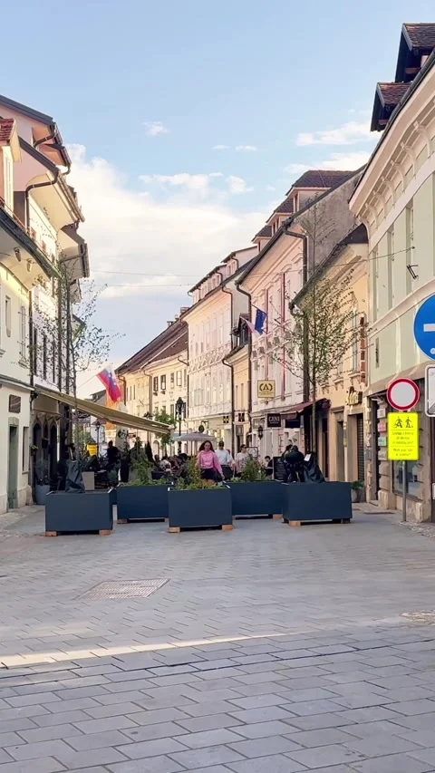 Vertical view of Kranj old town pedestrian street, with cafe terraces Stock Footage 339754566