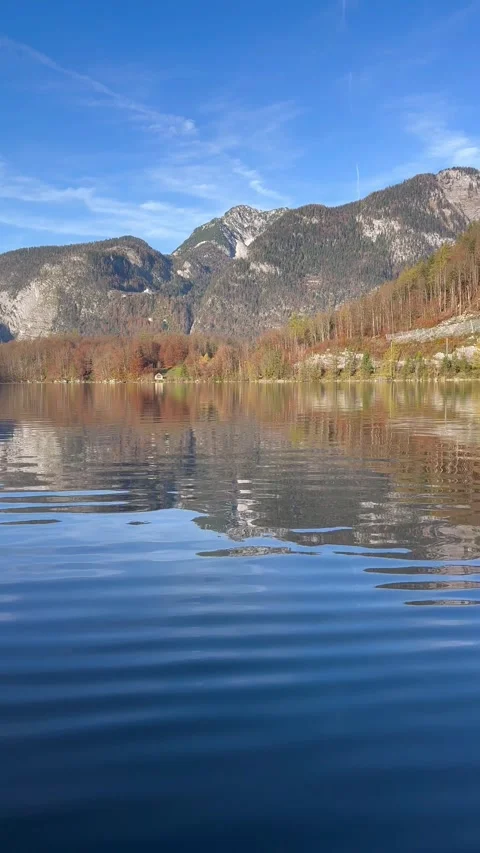 Vertical view of lake waters. Fresh air, blue sky along the horizon, mountain Stock Footage 292795404