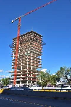 Vertical View of A large building with a crane on top of it in Guadalara Jalisco Stock Photos