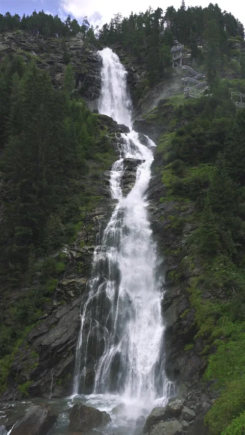 Vertical View of Large Stuibenfall Waterfall in Austrian Alps Nature Stock Footage 316968266