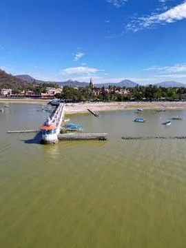 Vertical view of the lighthouse located on the pier of Lake Chapala Stock Photos