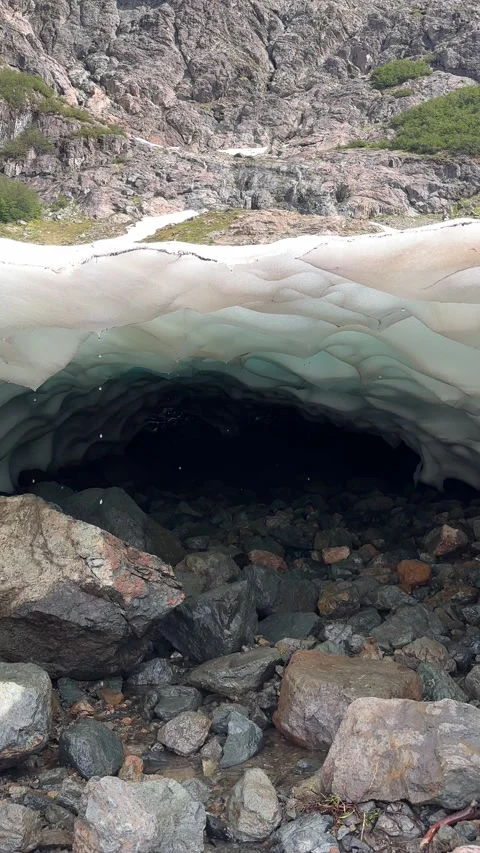 Vertical view of a little ice cave in El Bolson, Patagonia. Argentina. Stock Footage 284949947