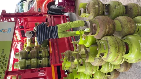 (Vertical view) LPG distribution. Feb 12, 2024. Yogyakarta, Indonesia. Video stock 279474864