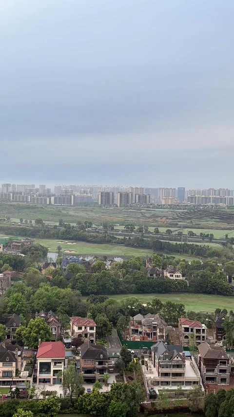 Vertical View Of Luxury Suburb And High-Rise Apartments Vídeo Stock 334902374