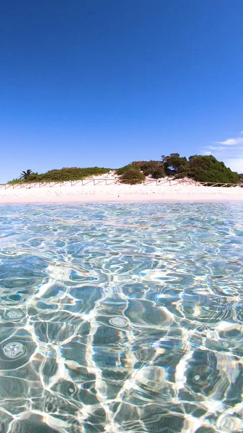 Vertical view of Maria Pia beach seen from the water Stock Footage 332303465