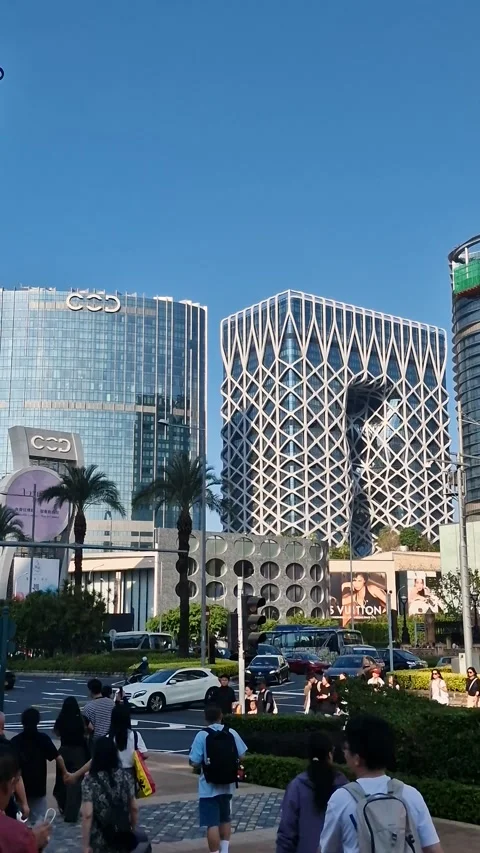 Vertical View of Modern Hotels on Cotai Strip and Traffic in Casino Area of Stock-Footage 335208212
