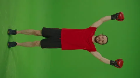 Vertical View . Motivated Professional Bearded Fighter Making Winning Gesture Stock Footage 220463756