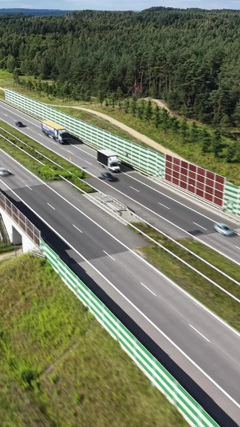Vertical view. Motorway traffic flow seen from a top down perspective Stock Footage 348630861